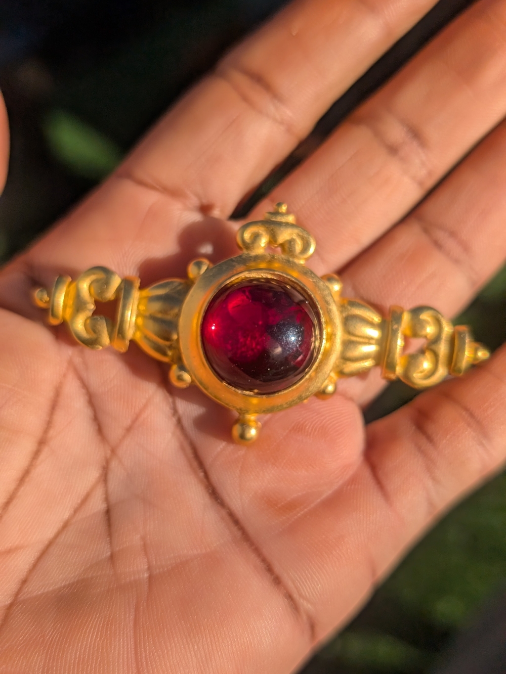 Gold-Tone Women’s Brooch with Deep Red Cabochon